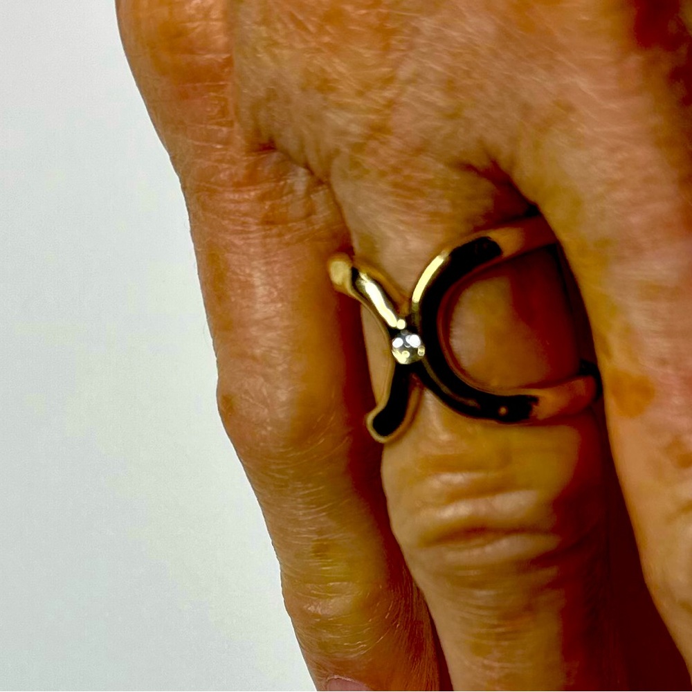 Gold double loop ring with cz diamond